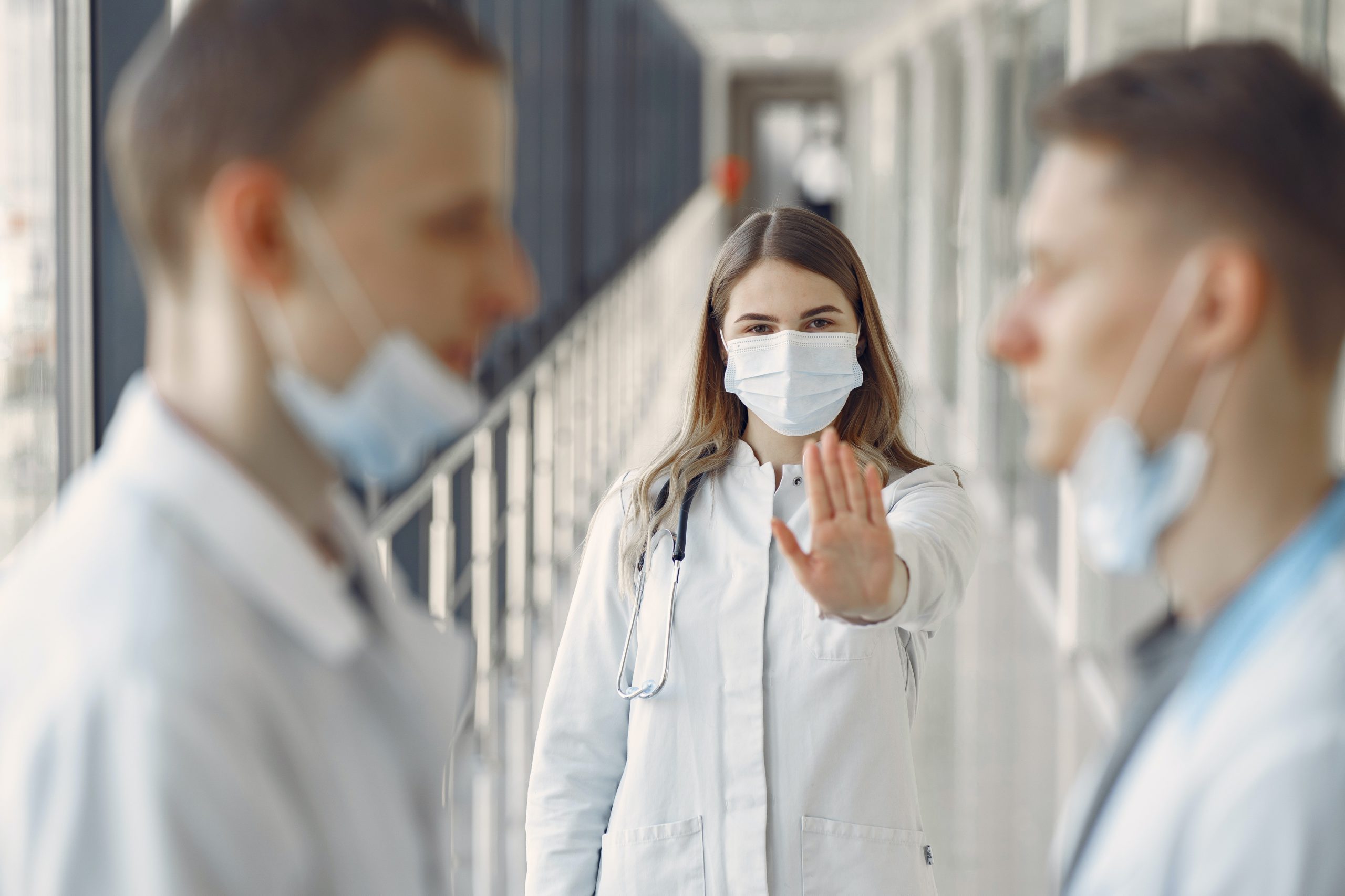 Woman Stopping Men Not Wearing Proper Face Mask